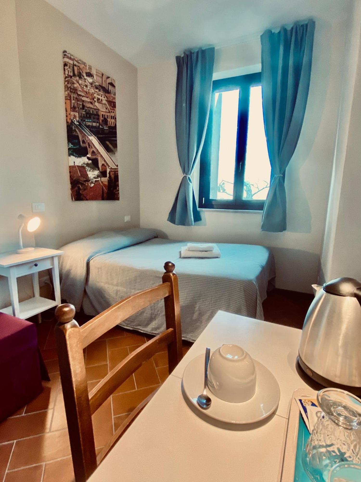 Residenza Cipressi E Olivi Apartment Verona Cameră foto